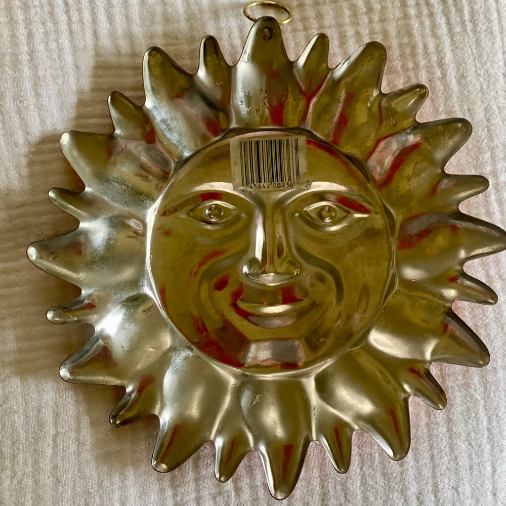 Copper Sun Wall Decor with Patterned Linens from Pottery Barn - Picture 3 of 8